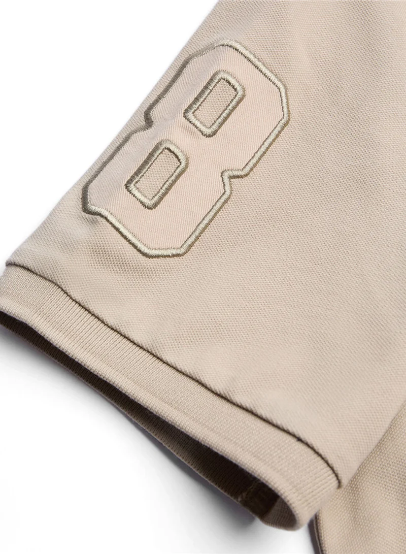 GIORDANO  Men’s Slim Fit 3D Lion Embroidery Lycra Pique Polo for Men | Best Price UAE